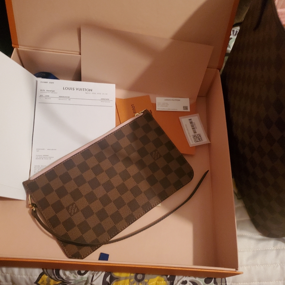 SOLD--Brand new Louis Vuitton damier eben bean Neverful pouch.